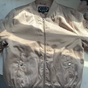 tan/gold bomber jacket